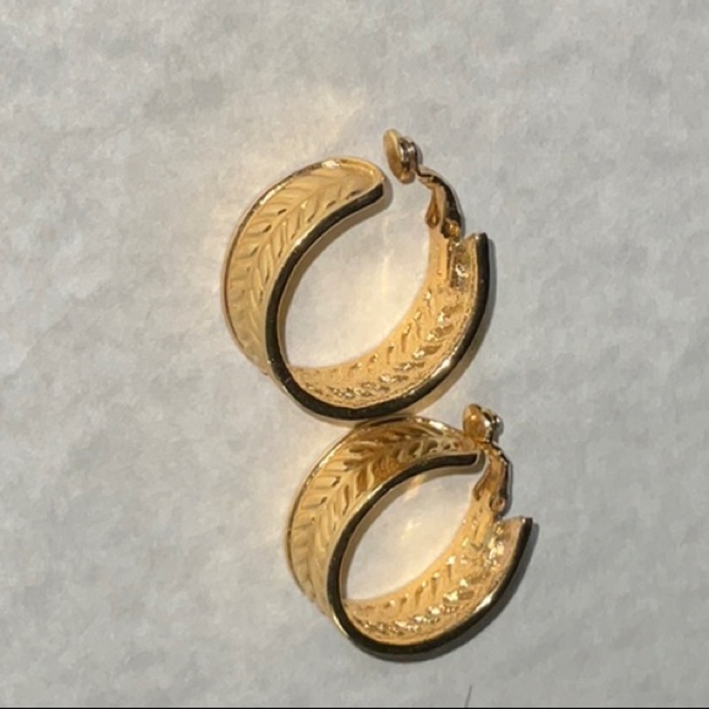 Givenchy New York Paris Gold Toned Metal Leaf Patterned Hoop Clip Earrings
